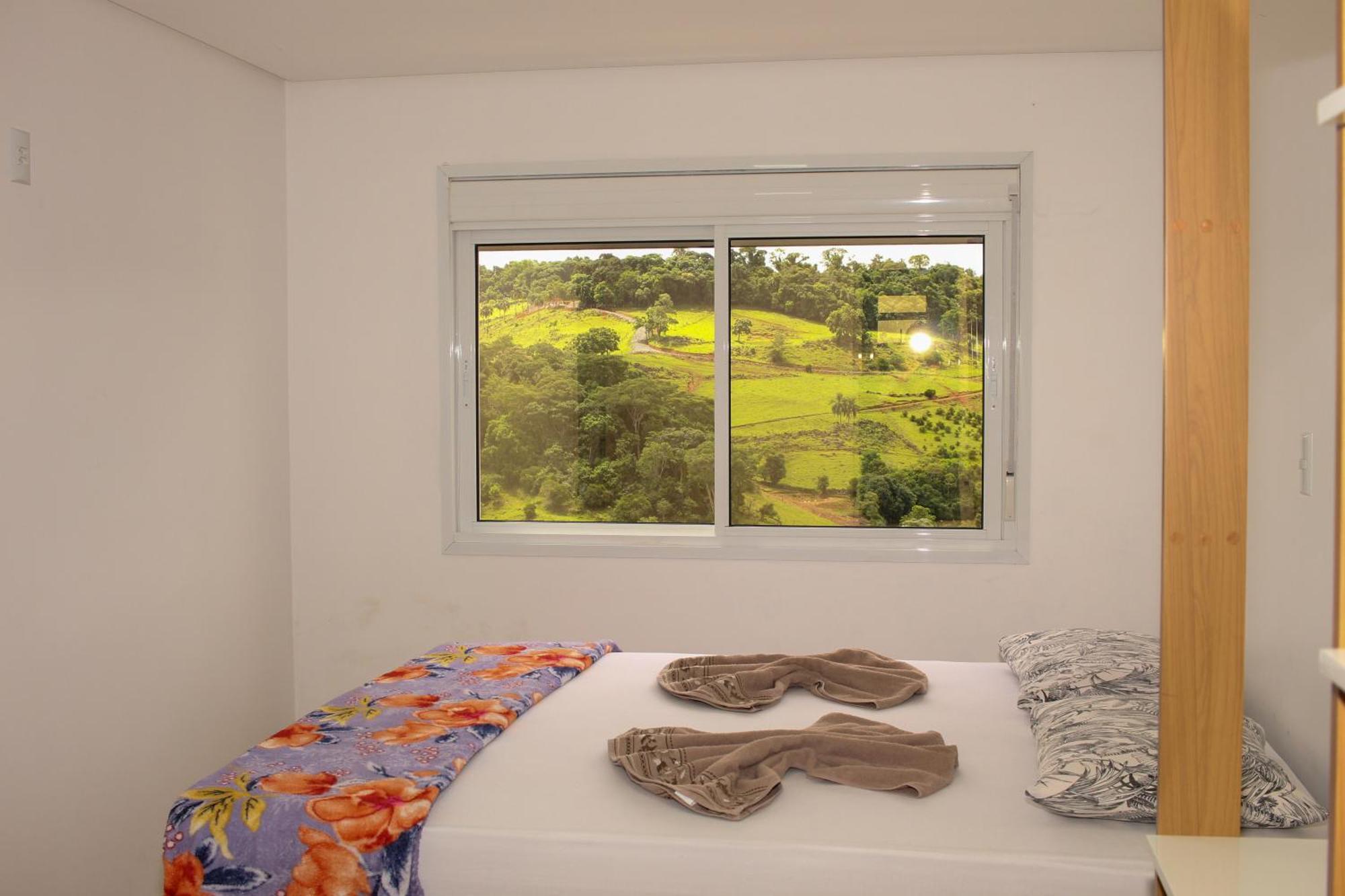 Com Linda Vista Em *